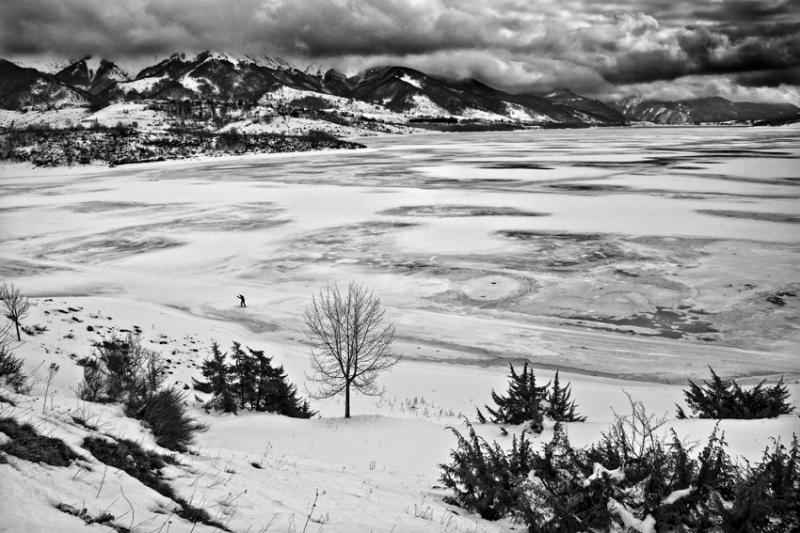MarioPignotti_SkiingOnAFrozenLake.jpg